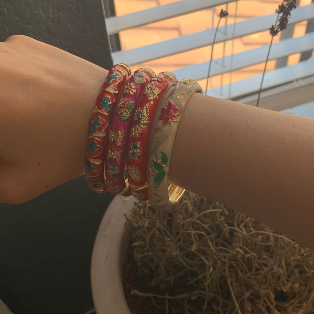 Gold colored designed bracelets